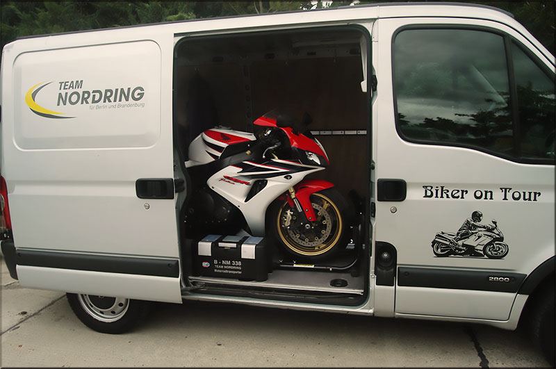 Moving a motorbike in the Transit van